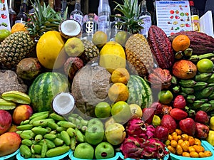 A bench of refreshing drinks filled with the most diverse tropical fruits.