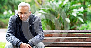 Bench, sad and thinking with senior man, depression and retirement with memory and emotions. Pensioner in park, old