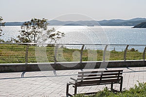 Bench and seascape scenery