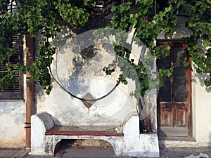 Bench on sidewalk, Sicily