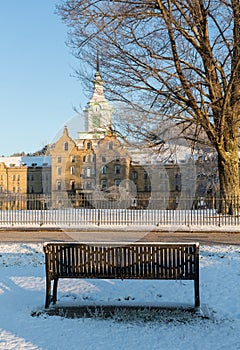 Bench in snow outside Trans-Allegheny Lunatic Asylum