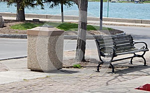 Bench And Stone Trash Receptacle