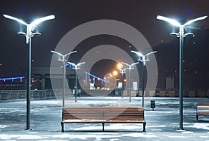 Bench and streetlamps