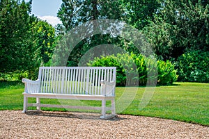 Bench in Traditional English Garden in summer