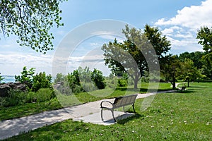 Bench and Trail along the Shore of Lake Michigan in Evanston Illinois during Summer