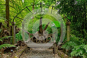 Bench under the gothic rustic arch