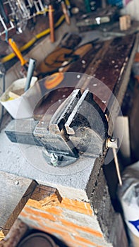 Bench vice on rustic workshop bench