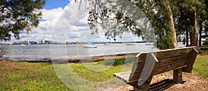 Bench view of Boats at the Ken Thompson park in Sarasota