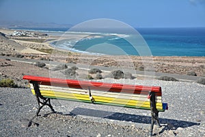 Bench with a view on Sotavento beach and lagoon at Fuerteventura island