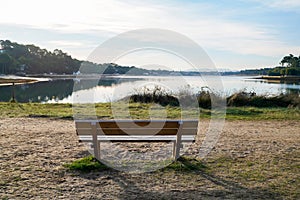 Bench wooden empty on lake hossegor in landes france