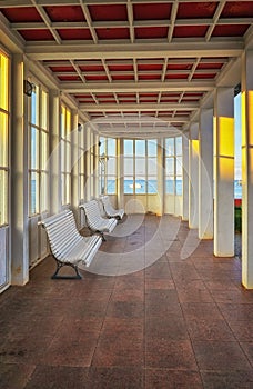 Benches in the beach hall at the spa hotel. Binz on the island of RÃ¼gen on the Baltic Sea. Mecklenburg-Vorpommern, Germany