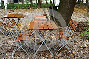 Benches and chairs at tables invite you to relax and unwind