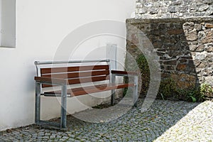 Benches and chairs at tables invite you to relax and unwind