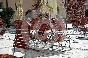 Benches and chairs at tables invite you to relax and unwind