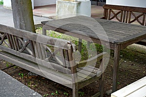 Benches and chairs at tables invite you to relax and unwind