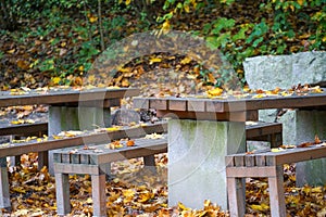 Benches and chairs at tables invite you to relax and unwind