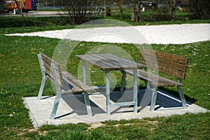 Benches and chairs at tables invite you to relax and unwind