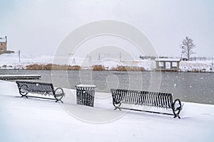 Benches facing a lake on a winter day in Utah