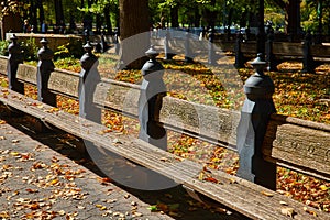 Benches of iconic The Mall Central Park in New York City during fall