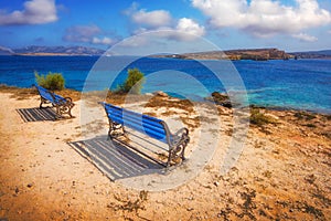 Benches overlooking a beach on Pano Koufonisi island