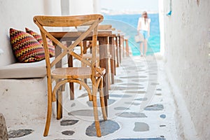 Beautiful typical greek outdoor cafe in Mykonos with amazing sea view on Cyclades islands