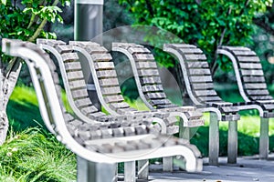 Benches in Salesforce Park in San Francisco, close-up, shallow depth of field, photograph processed in pastel colors