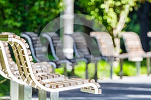 Benches in Salesforce Park in San Francisco, close-up, shallow depth of field, photograph processed in pastel colors