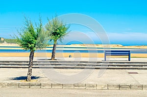 Benches on the seafront in the village of Mogro, Cantabria, northern Spain photo