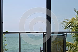 A benchin balcony with beautiful sea view