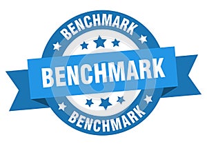 benchmark round ribbon isolated label. benchmark sign.