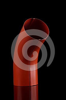 Red water spout element isolated on the black