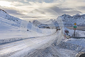 A bend in the Norwegian section of the E10 named Kong Olav Vs vei. The road curves through the beautiful scenery of the Lofoten i