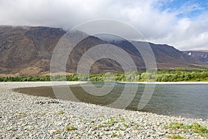 The bend of the Sob river at the foot of the Rai-Iz mountain range. Polar Urals, Yamal photo