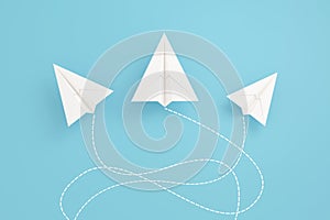 Bended paper planes are flying differnt directions. Aerospace industrie and air control concept. 3d illustration