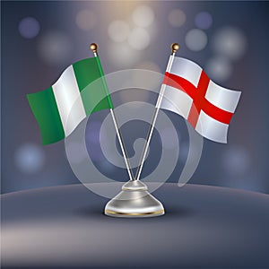 Nigeria VS England flag Relation in a stand on table photo