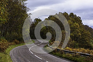 Bendy, country road in Scottish highlands in autumn