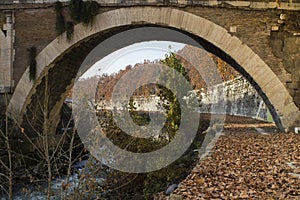 Beneath the bridge of Fabricius in Rome