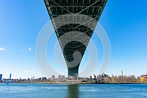 Below the Triborough Bridge connecting Astoria Queens New York to Wards and Randall`s Island over the East River photo