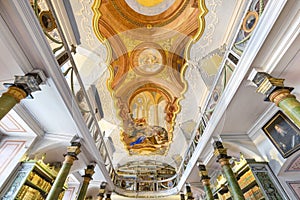 The Benedictine monastery with  the church of St Adalbert from 14th century. Beautiful baroque Catholic church interior in Broumov