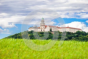 The Benedictine Pannonhalma Archabbey with clouds in Hungary