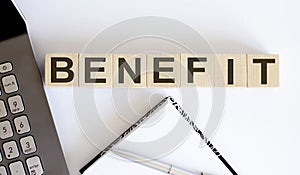 Benefit - business concept text on the wood block