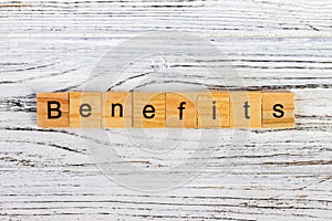 BENEFITS word made with building blocks. concept