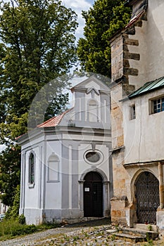 Benesov nad Ploucnici, North Bohemia, Czech Republic, 26 June 2021:  old gothic church of the Nativity of the Virgin Mary with