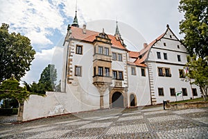 Benesov nad Ploucnici, North Bohemia, Czech Republic, 26 June 2021: old saxoxy renaissance Morzinov Castle near Town Hall at