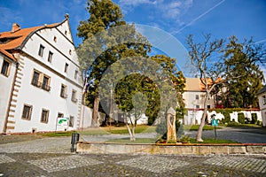 Benesov nad Ploucnici, North Bohemia, Czech Republic, 2 October 2021: main town square, old saxoxy renaissance Morzinov Castle at
