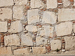 Wall in stone blocks photo