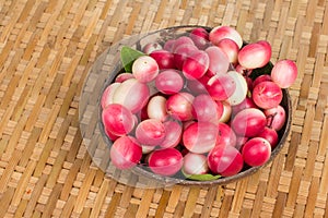 The bengal-currants in coconut shell