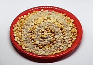 The Bengal gram dal on the red plate