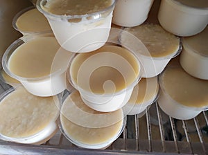 Bengal`s famous yogurt `mishti doi` is kept in some plastic cup