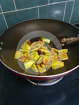 Bengali style potol or parwal fry (vegetable).